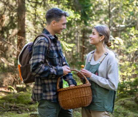 Man and woman with mushroom basket