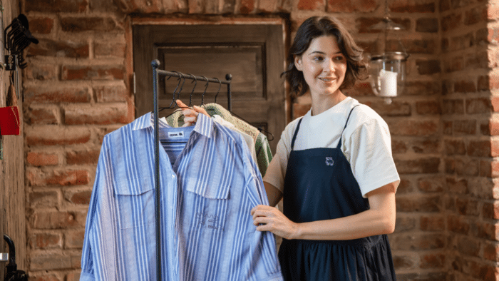 woman holding Moz clothes